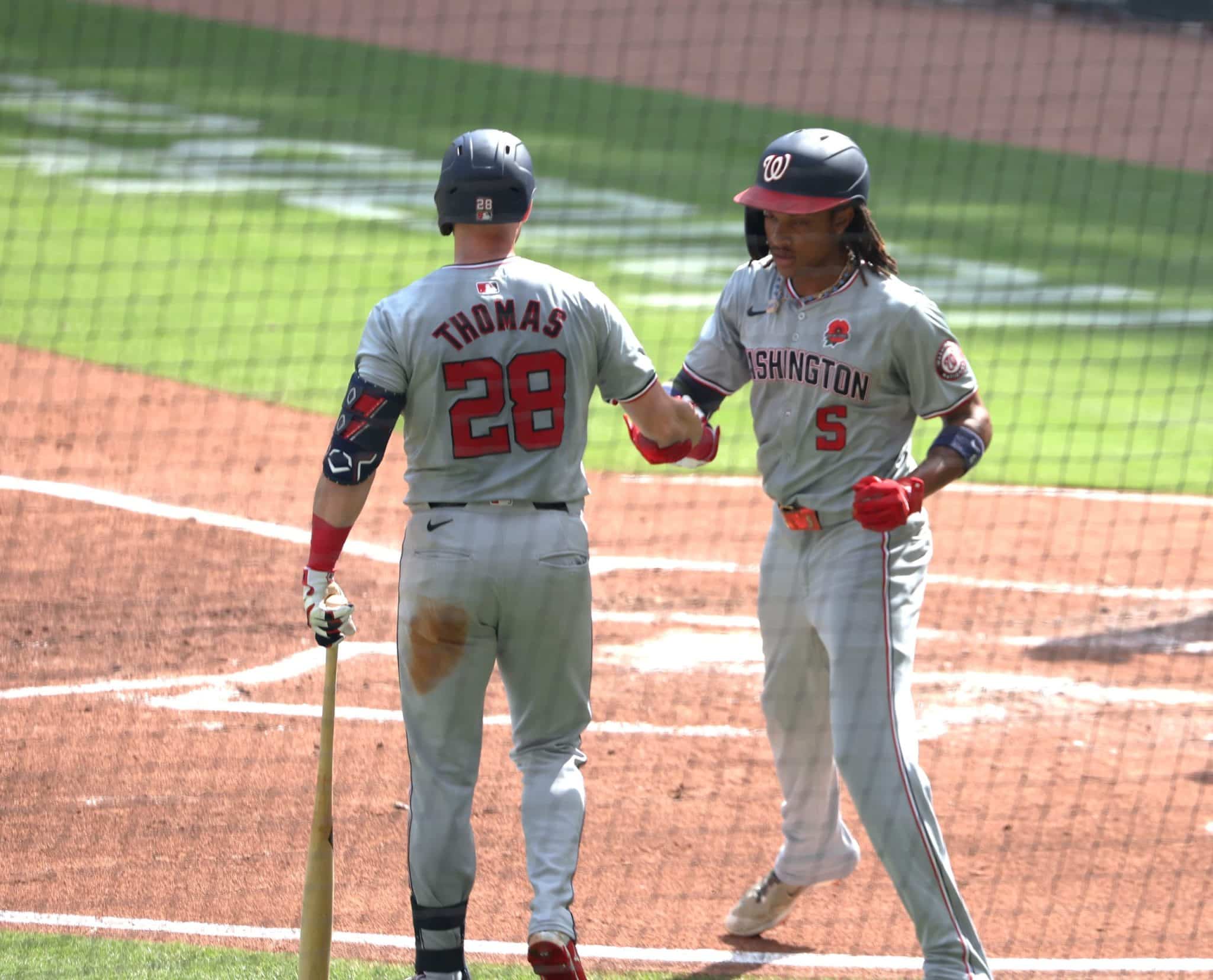 Lane Thomas and CJ Abrams celebrate after an Abrams' home run in Atlanta.